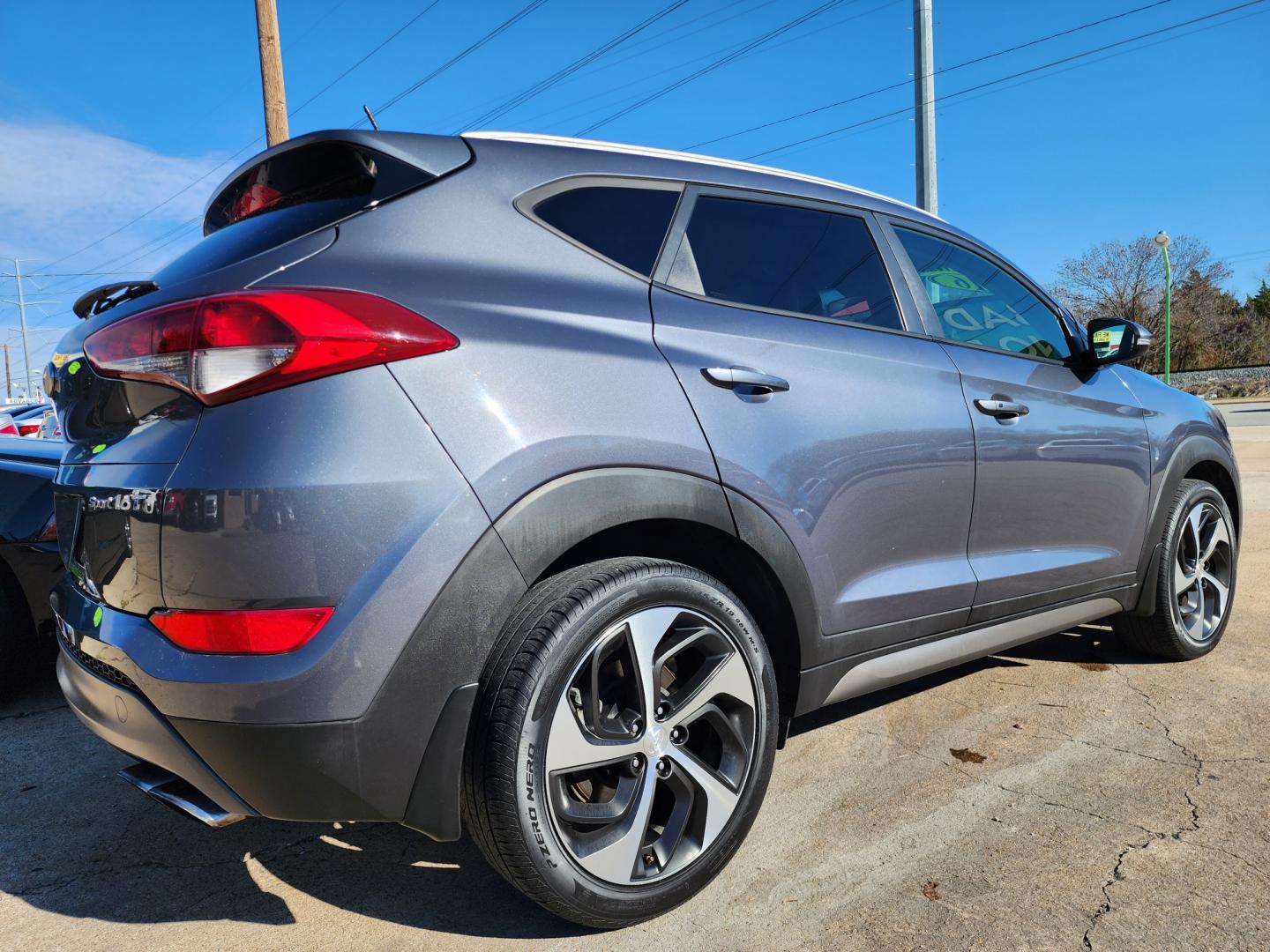 2016 BLACK Hyundai Tucson Sport (KM8J33A21GU) with an 1.6L L4 DOHC 16V engine, 7A transmission, located at 2660 S.Garland Avenue, Garland, TX, 75041, (469) 298-3118, 32.885551, -96.655602 - Welcome to DallasAutos4Less, one of the Premier BUY HERE PAY HERE Dealers in the North Dallas Area. We specialize in financing to people with NO CREDIT or BAD CREDIT. We need proof of income, proof of residence, and a ID. Come buy your new car from us today!! This is a Very clean 2016 HYUNDAI TUC - Photo#3